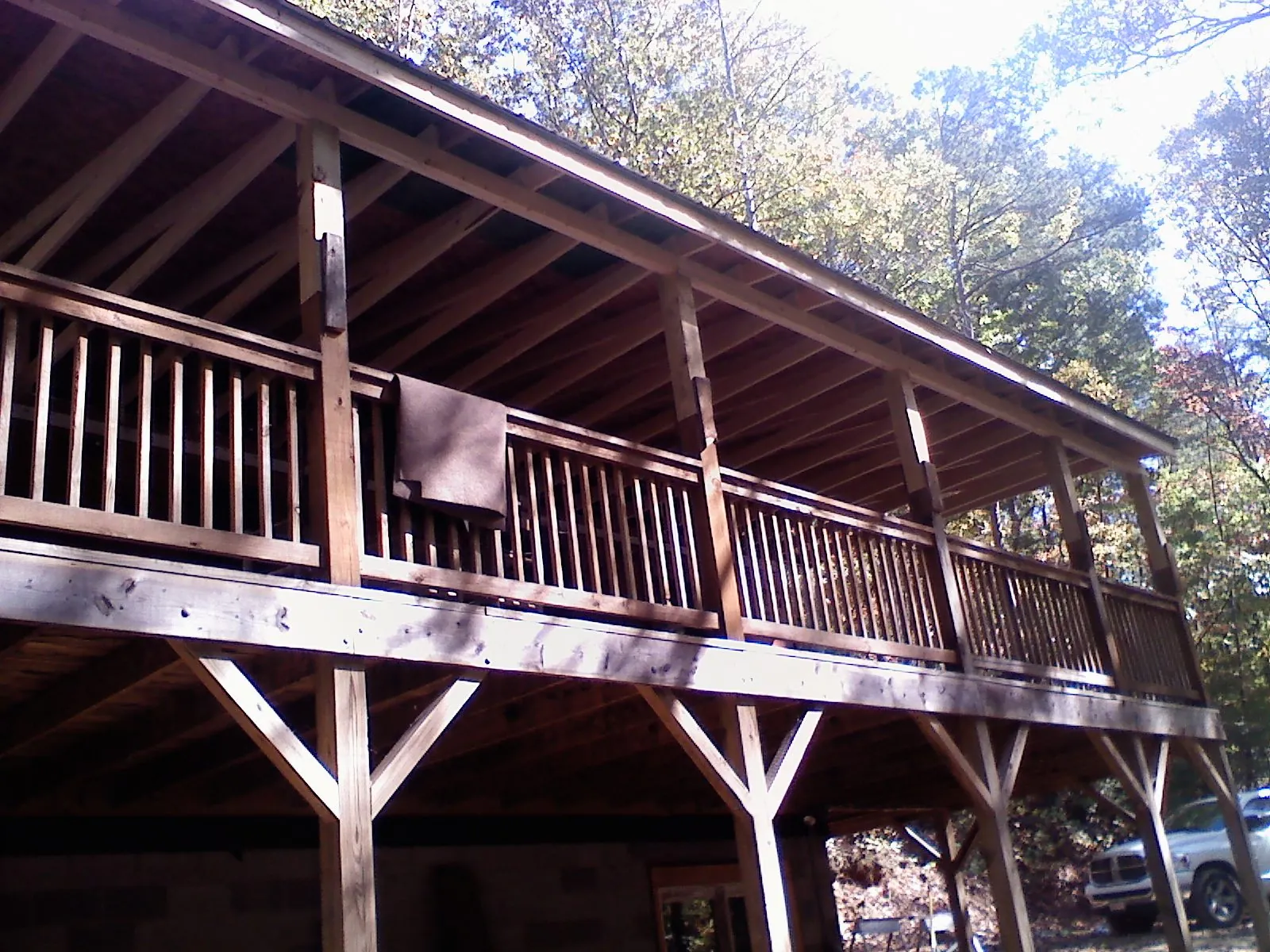 Timber framing under a new elevated porch and deck — Roof Leak Repair in Sun River by Roofing Brothers